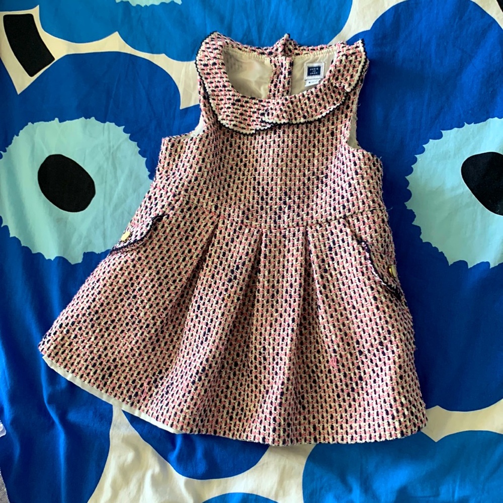 Pretty dress with some some pulled threads.